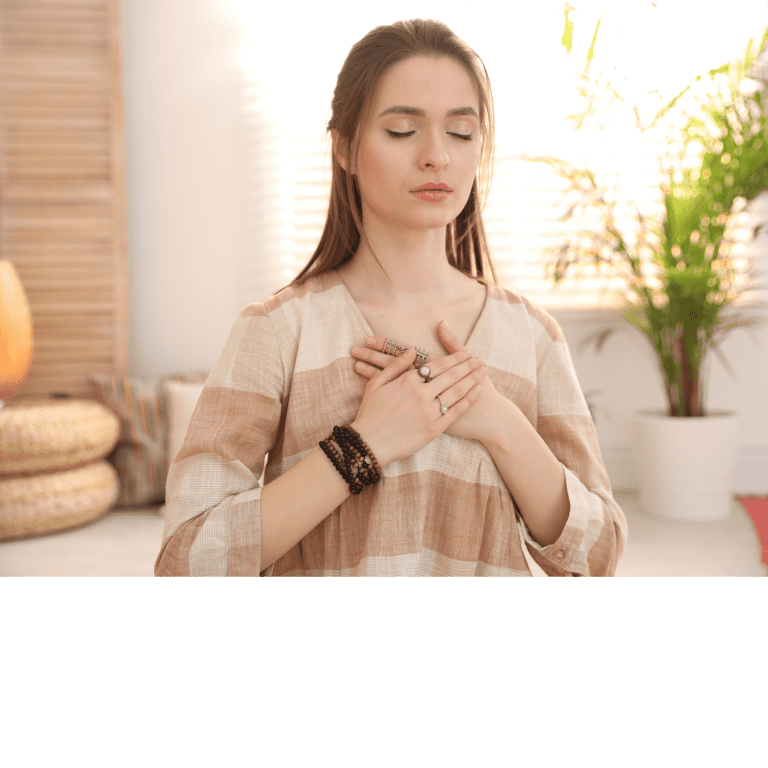 Ar Holistic Therapy - Bradford - A woman with her hands on her chest, deeply immersed in inner meditation.