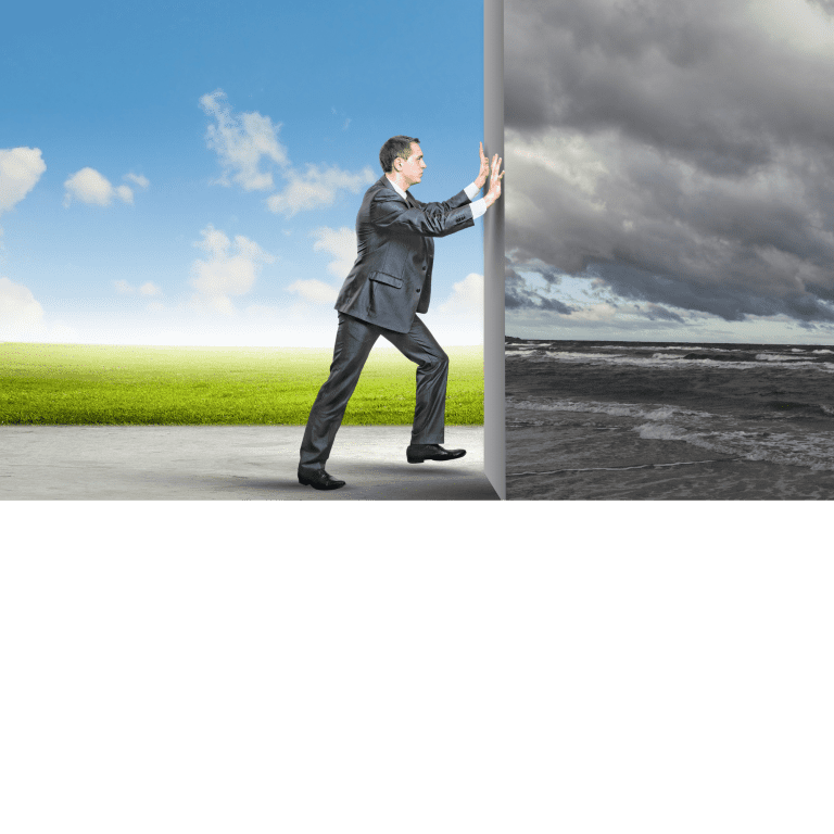 Ar Holistic Therapy - Bradford - A businessman is reaching out to a wall with a stormy sky behind him, depicting the reality of his struggles.