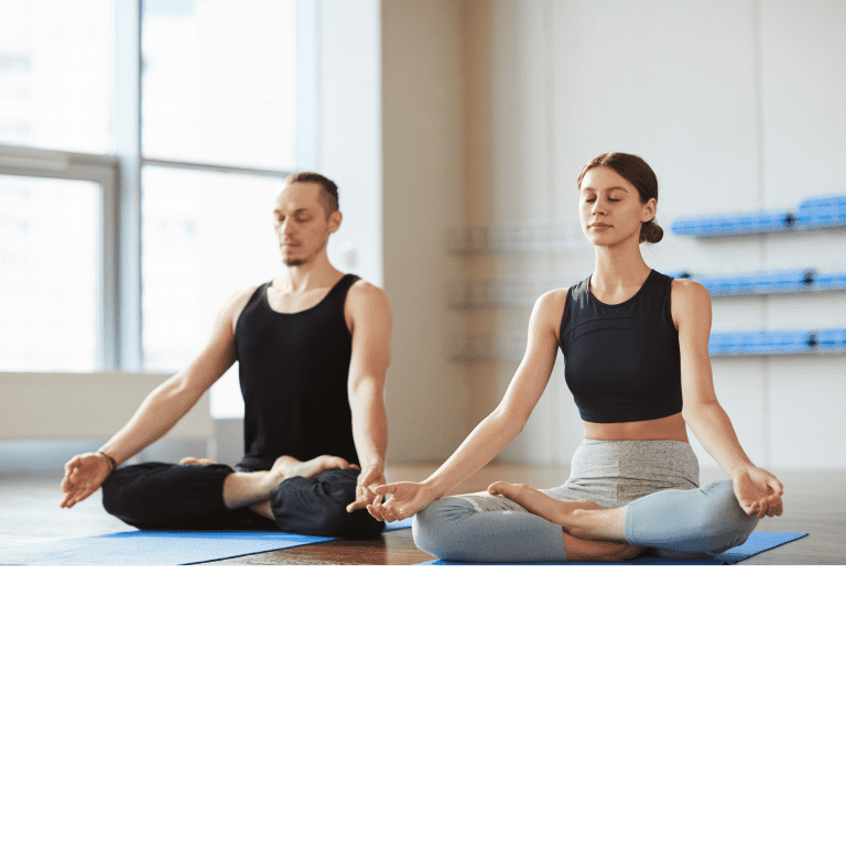 Ar Holistic Therapy - Bradford - A man and woman meditating in a yoga studio, cultivating their relationship through peaceful mindfulness.