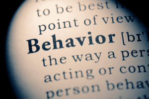 Ar Holistic Therapy - Bradford - Close-up of a dictionary definition focusing on the word "behavior.